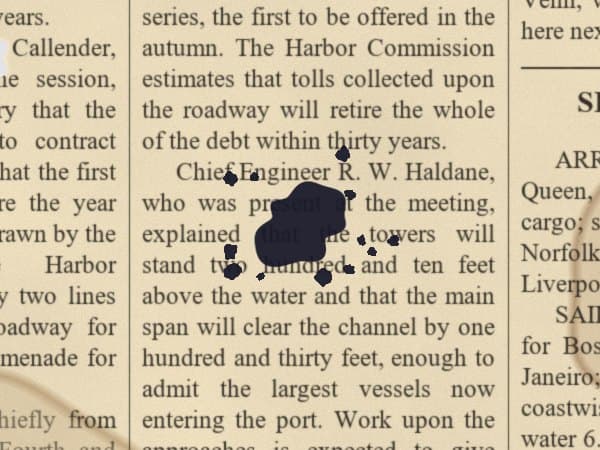 Ink blot on an old newspaper before restoration