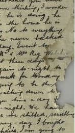 Document with missing corners before restoration