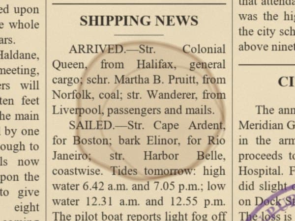 Close-up of the coffee ring on the old newspaper before restoration